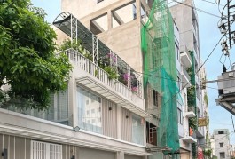 BÁN NHÀ MẶT TIỀN 60M2 6 TẦNG THANG MÁY 12 PN NGANG 6M KD ĐỈNH NGUYỄN THỊ HUỲNH 15.5 TỶ.